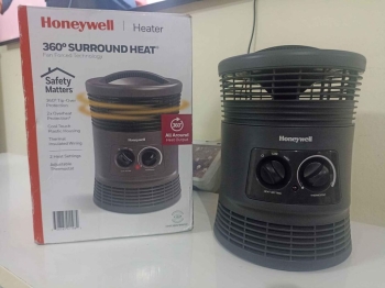 Calentador honeywell con termostato ajustable y dos temperatura de cal