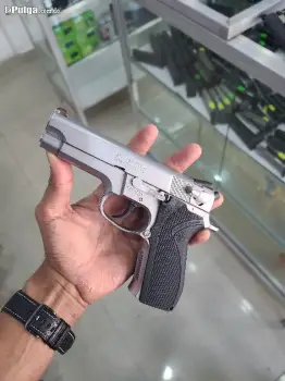 Pistola armas de fuego ofrezco comprar comision extra al que la traiga