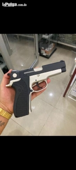 Pistola smith and wesson modelo 910 nuevesita tramiste incluidos.