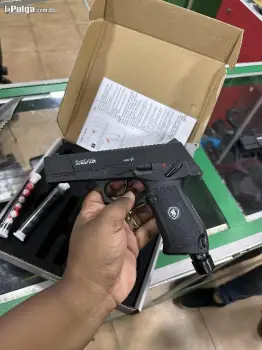 Pistola traumática de bala de goma y gas