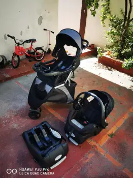 Coche y cargador y soporte evenflo mas corral graco  colcon