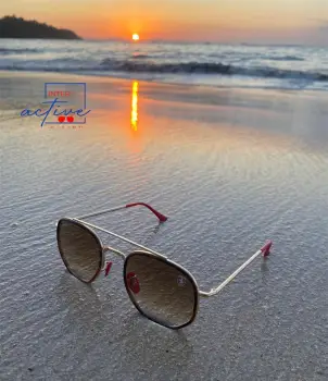 Lente rayban ferrari dorado y cristal marron