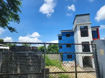 En venta solar y edificio comercial en la vega rd