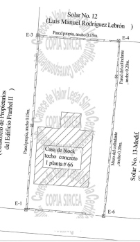 Solar de 338.67 m2 con una mejora en ens. ozama