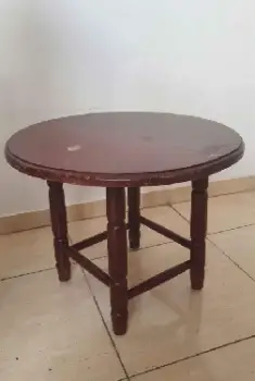 mesa de centro de caoba redonda en la romana