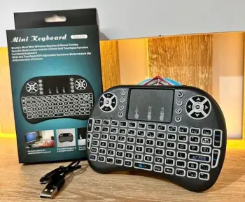 Teclado inalámbrico con touch pad y batería recargable para smart tv t
