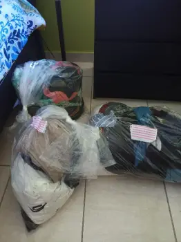 Lote de ropa nuevas y usadas en santo domingo oeste