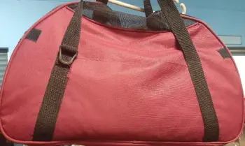 Bolso para pasear perros.