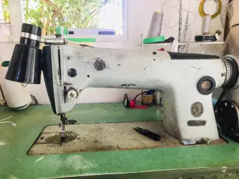 Máquina de coser plana industrial singer en peravia