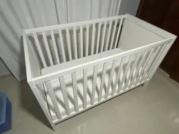 Cama cuna con barra protectora