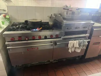 Estufa vulcan con horno y plancha