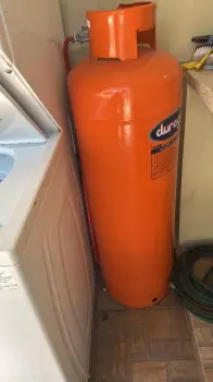 Tanque de gas seminuevo 100 lbs capacidad para 27 galones marca duraga