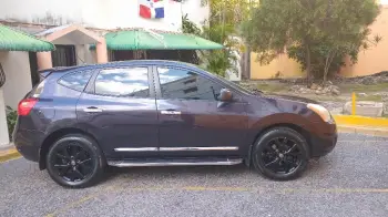 Nissan rogue 2013 en letrero oportunidad