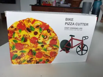 Cortador de pizza en forma de bicicleta
