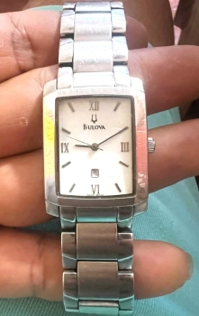 Reloj bulova cuarzo japonés ac/inox fechero usado