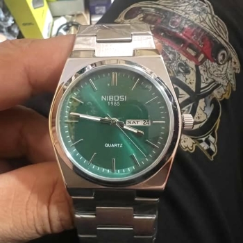 Reloj nibosi movimiento cuarzo japonés fechero manecillas luminosas ac