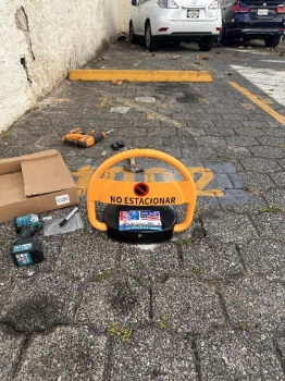 Bloqueador de parqueos a control remoto