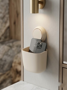 Soporte con base adhesiva para teléfono celular de pared