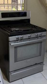 Estufa frigidaire gallery de 5 quemadores con plancha