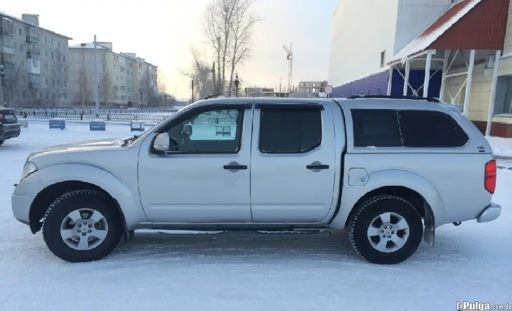 Viseras Nissan Frontier 2005 al 2015 laterales tapa sol Foto 7024755-2.jpg