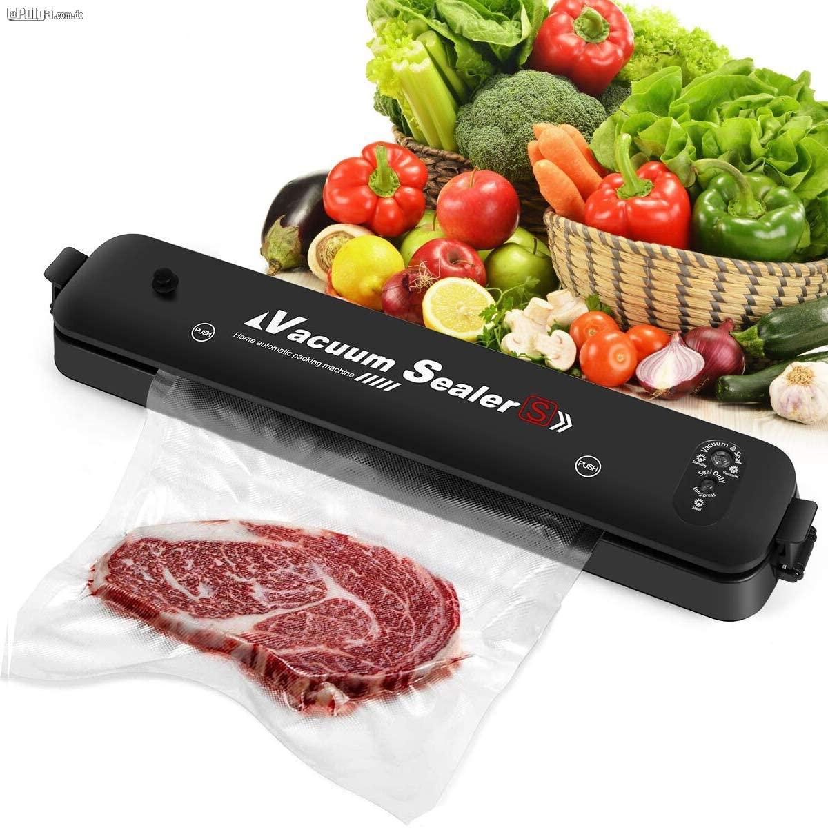Vacuum Sealer selladora de plastico automática con sistema de sellado Foto 7138166-2.jpg