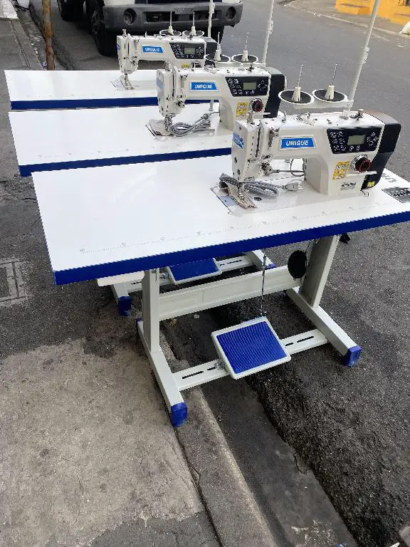 maquina de coser industrial con corte de hiloy luz integrada Foto 7148737-G6.jpg