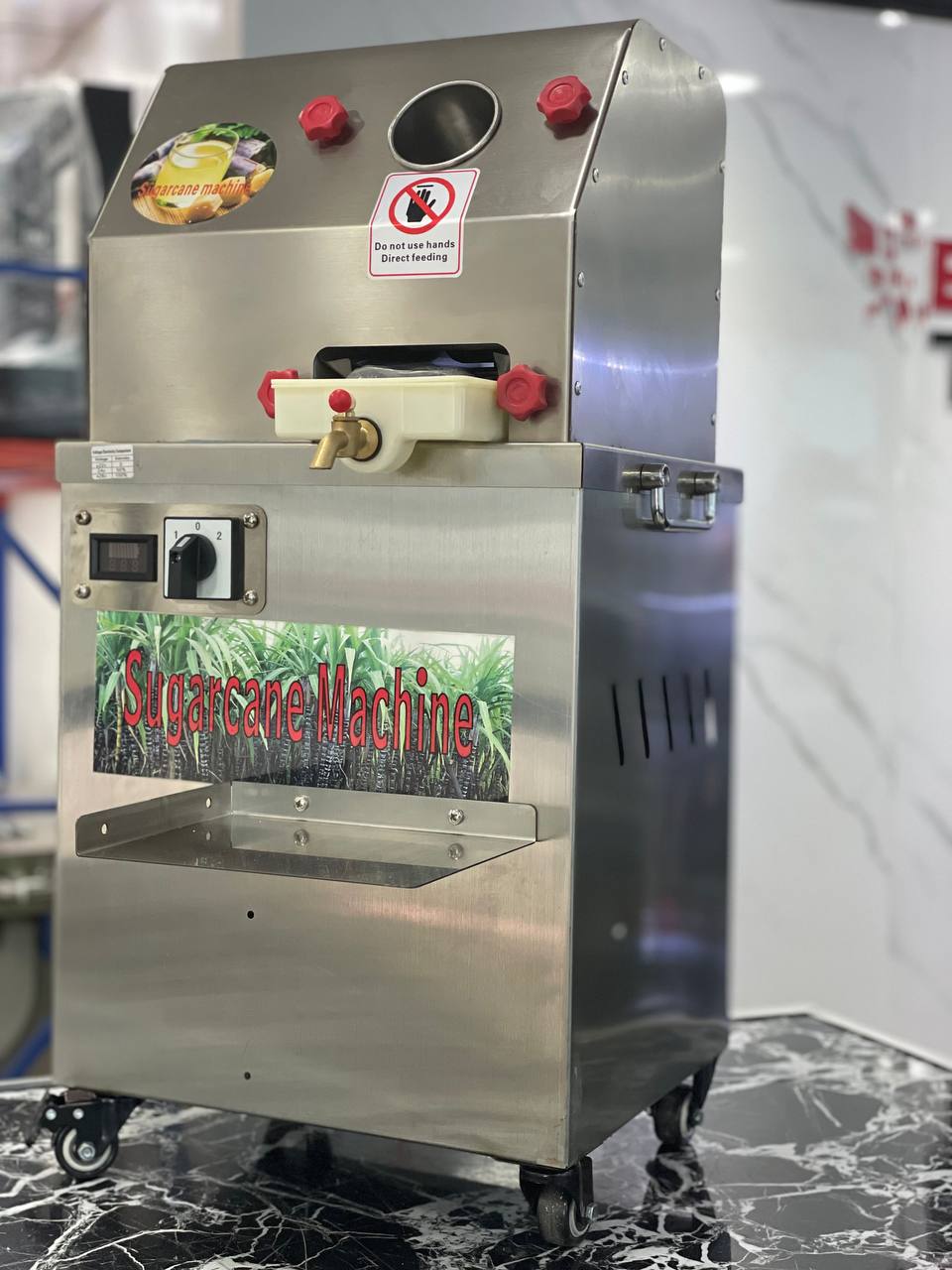 Maquina extractor trapiche de jugo caña con bateria interna recargable Foto 7239417-5.jpg