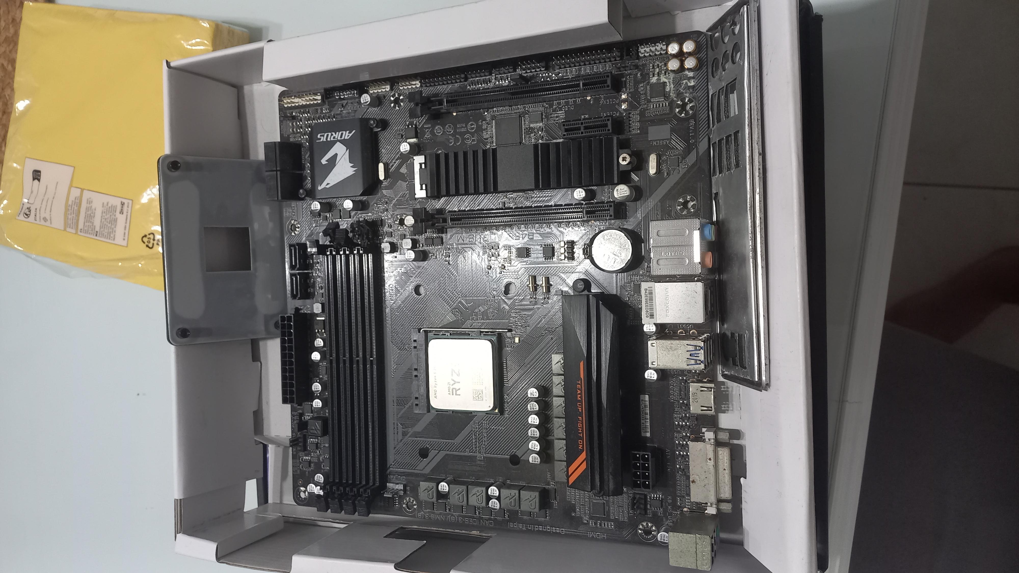 Placa madre Gigabyte B450 Aorus M con procesador AMD Ryzen 5 2600 con  Foto 7247977-4.jpg