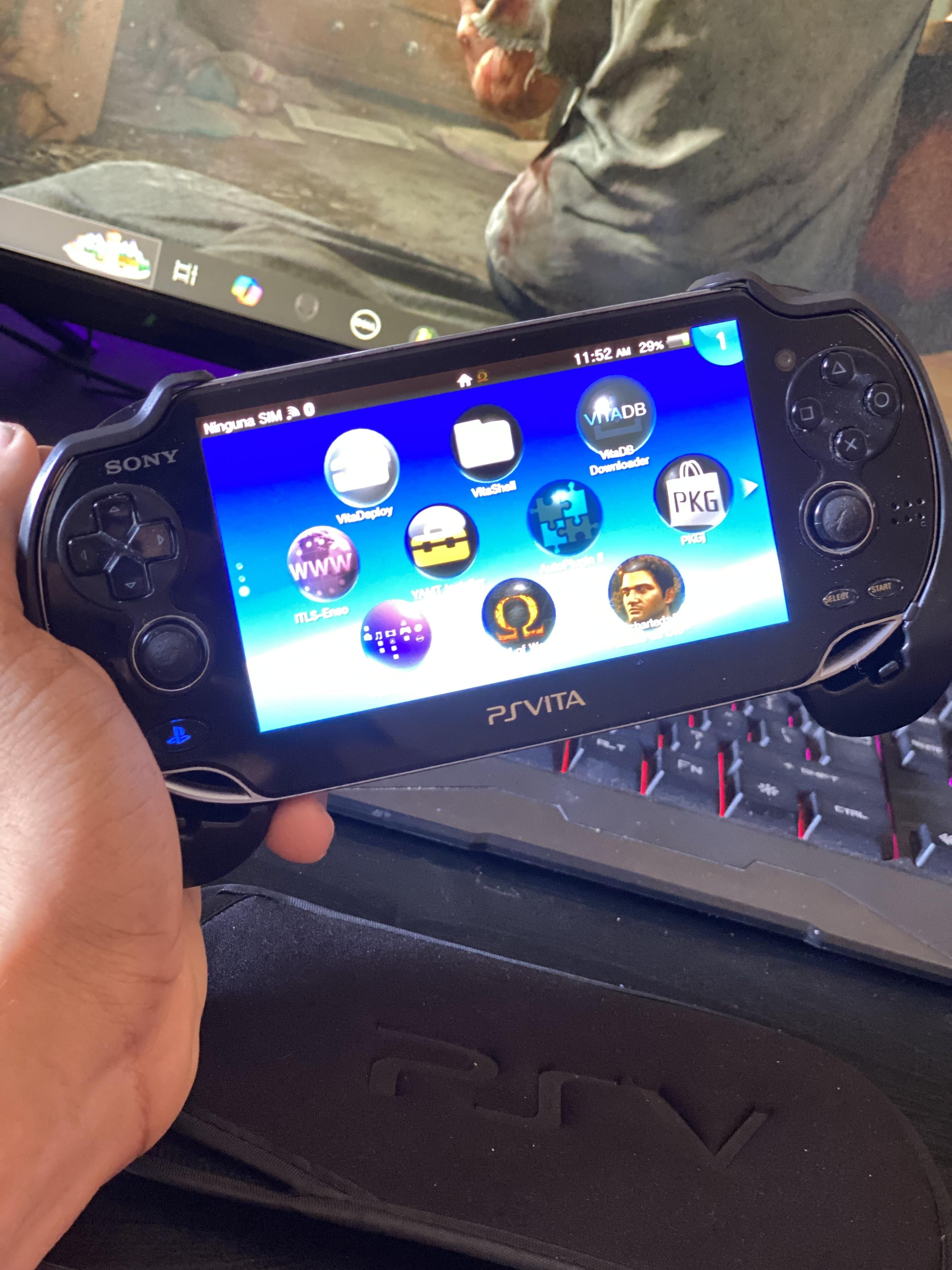 PsVita oled Hakeado con tienda y juegos Foto 7266032-10.jpg