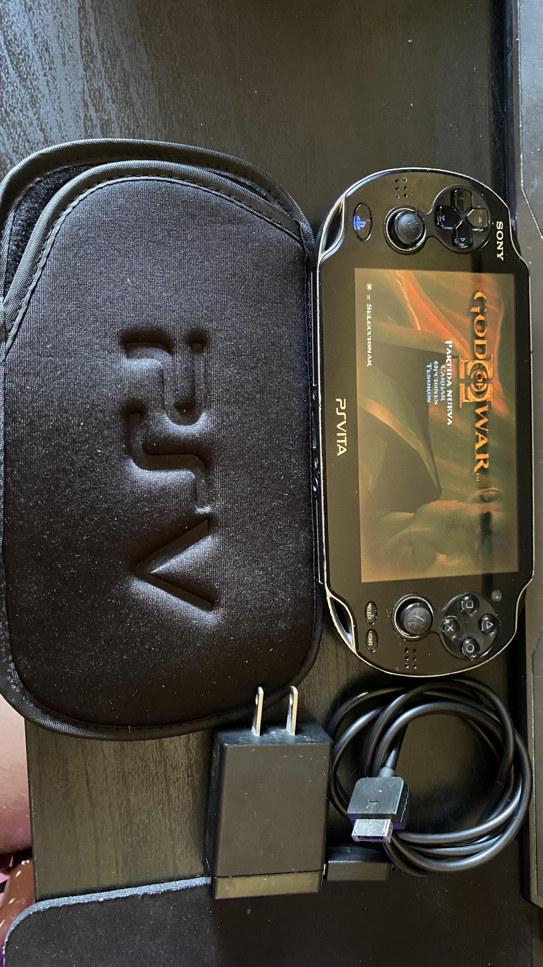 PsVita oled Hakeado con tienda y juegos Foto 7266032-5.jpg