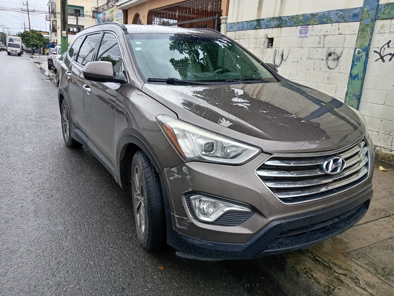 2014 Hyundai grand santa fe - 3 filas asientos Foto 7270669-2.jpg