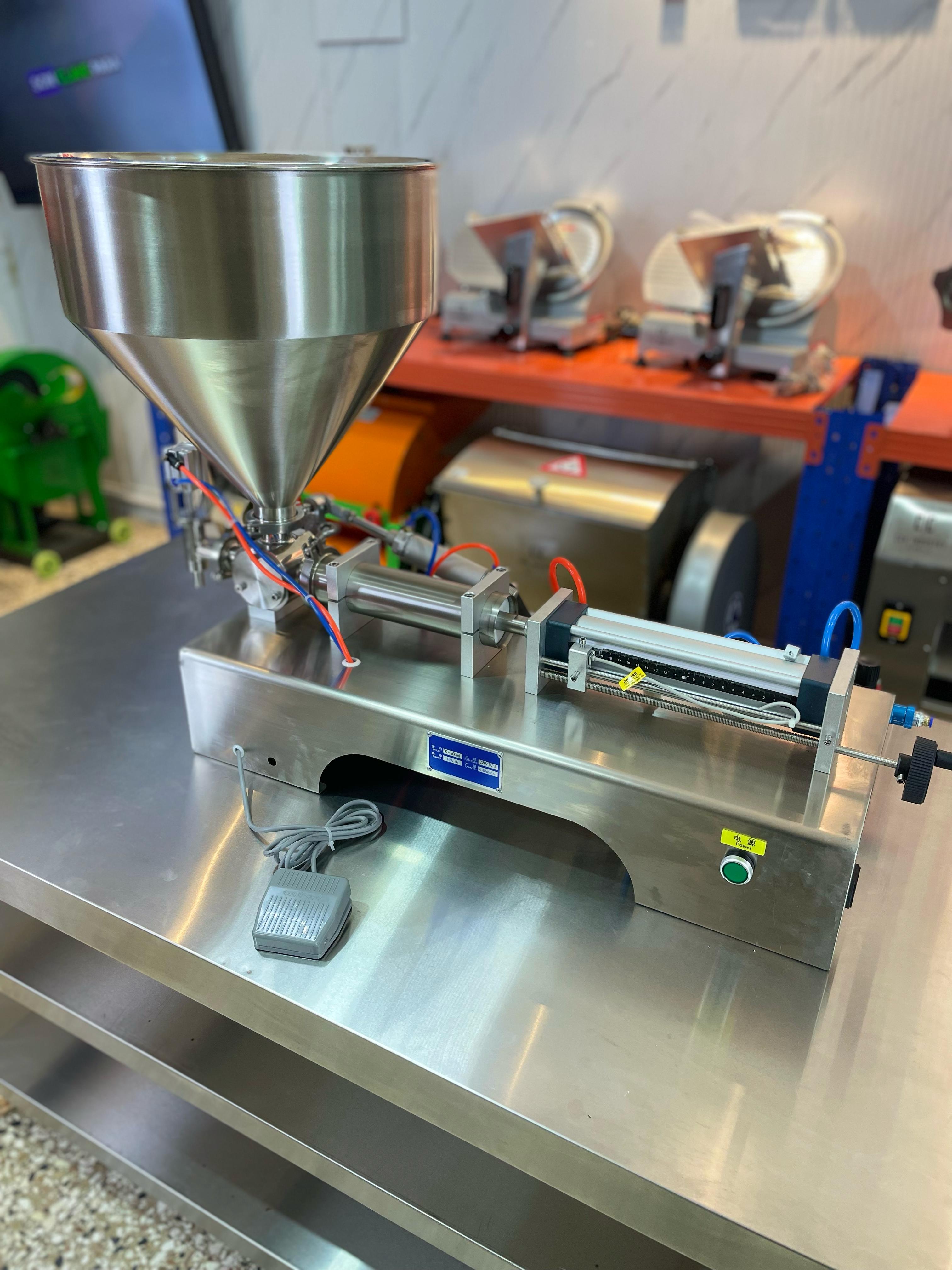 Llenadora automatica de liquidos viscosos shampoo miel jugo aceite sal Foto 7271627-10.jpg