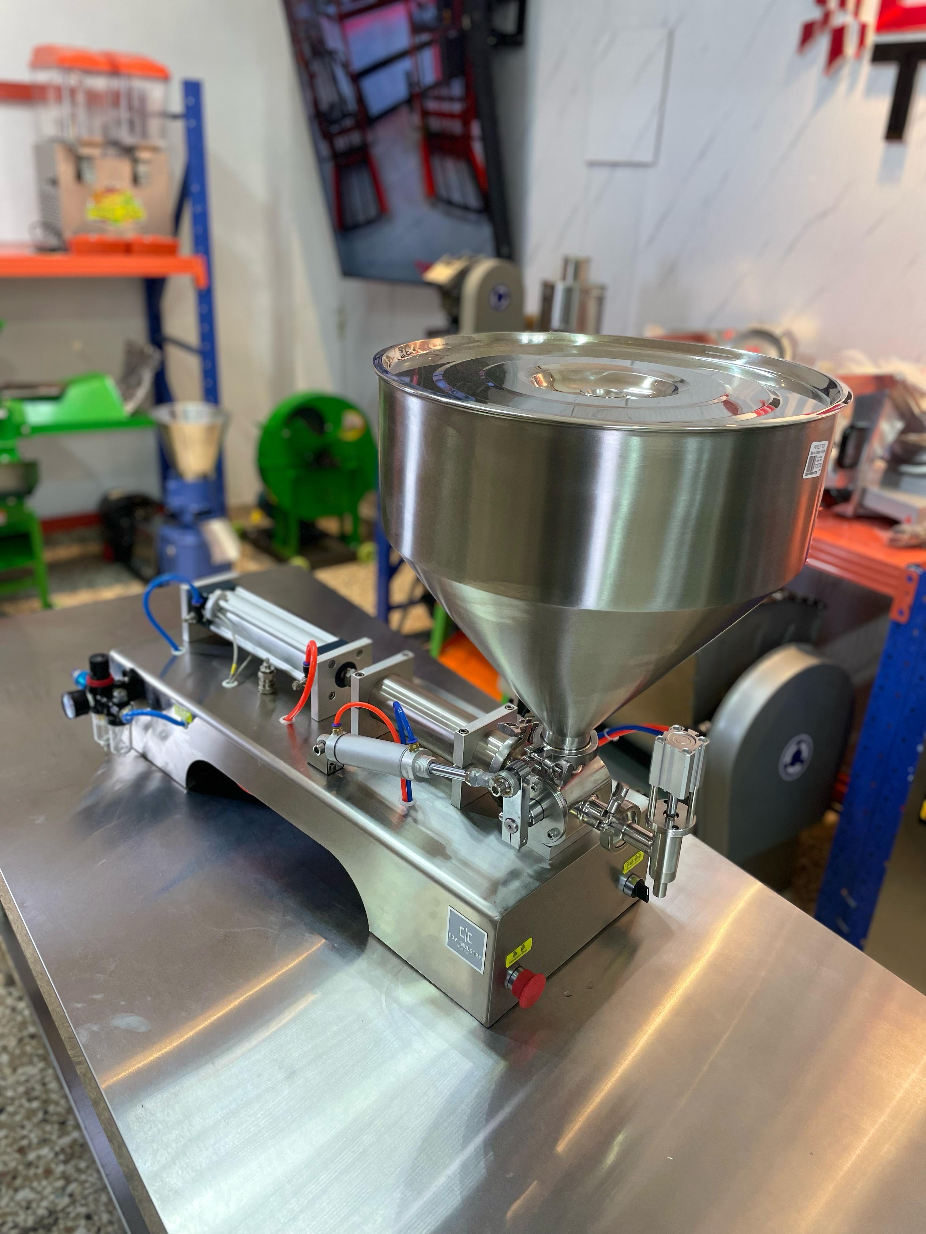 Llenadora automatica de liquidos viscosos shampoo miel jugo aceite sal Foto 7271627-3.jpg