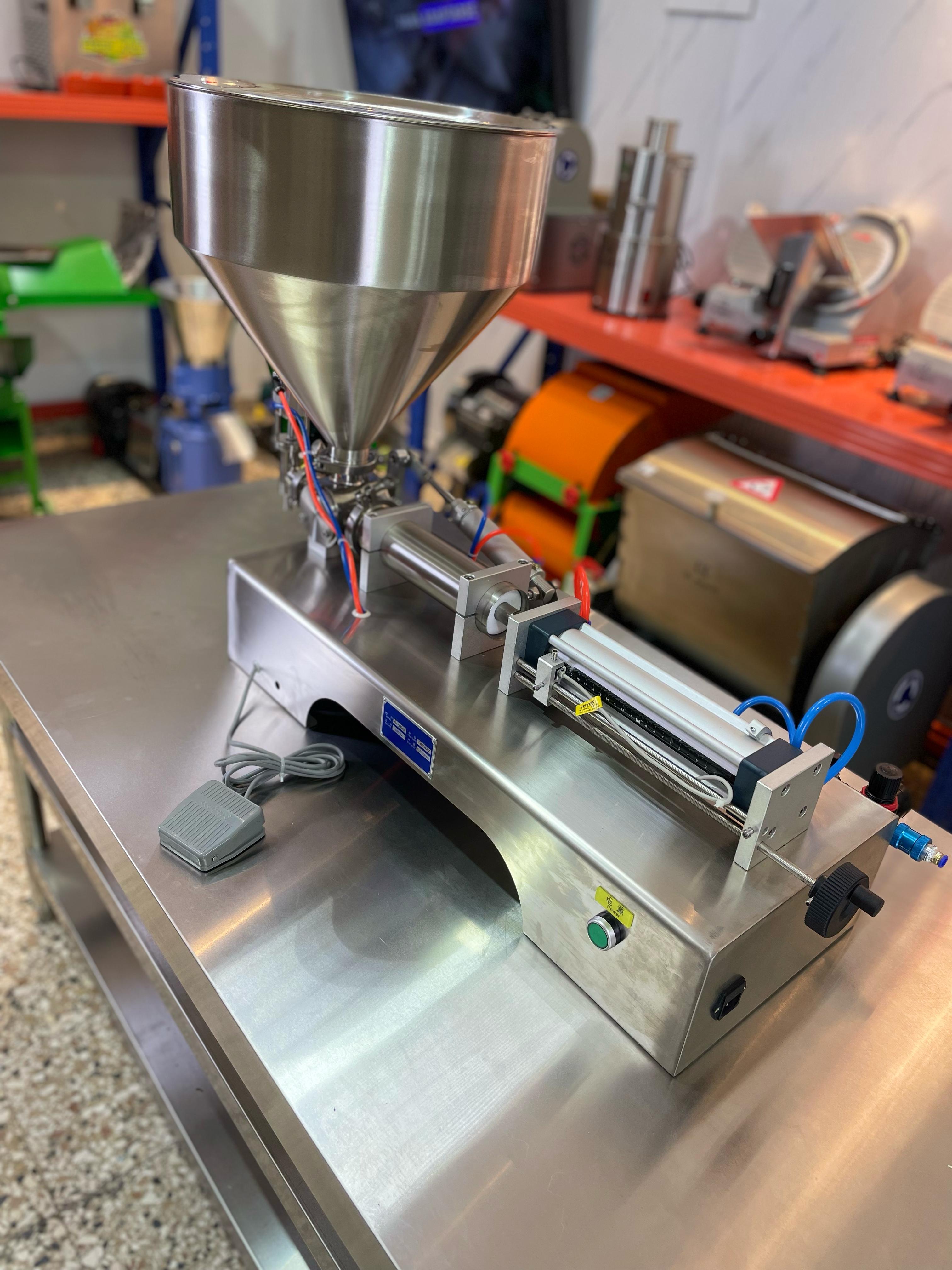 Llenadora automatica de liquidos viscosos shampoo miel jugo aceite sal Foto 7271627-8.jpg