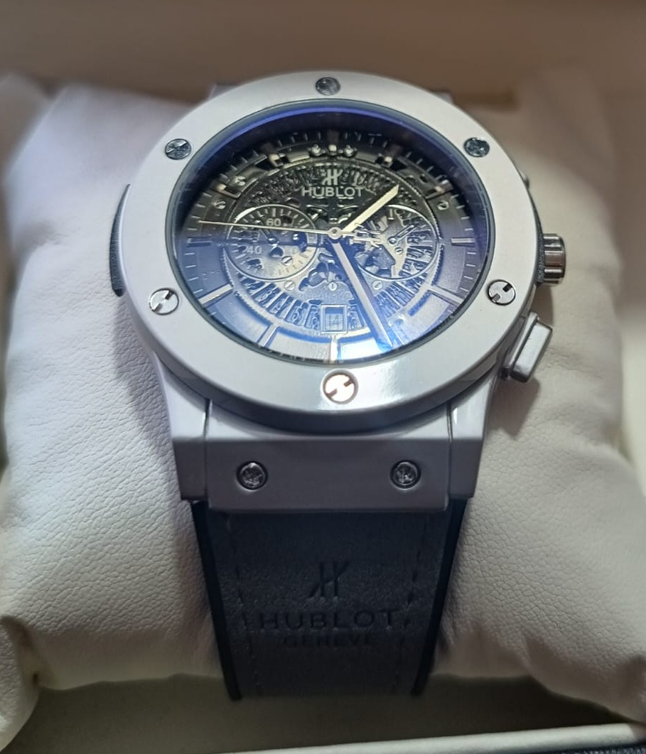 Reloj  con Caja acero inox correa silicona ajustable fechero Foto 7289913-10.jpg