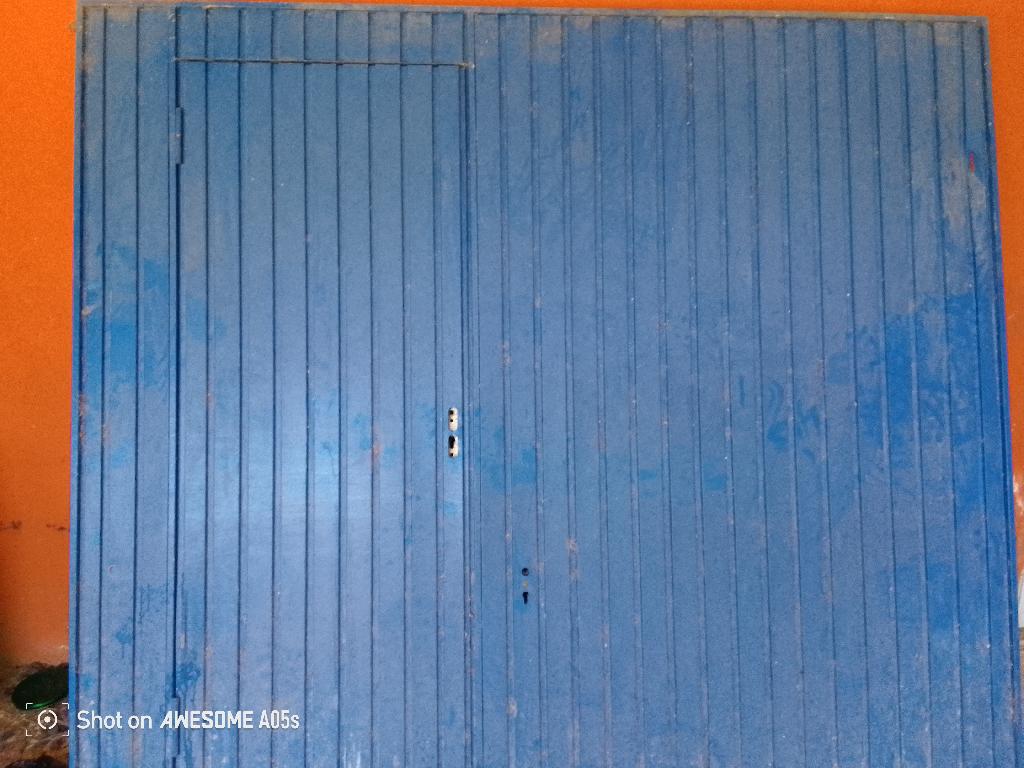 Puerton de garaje para marquesina inoxidable tiene 9 pie de ancho y 7  Foto 7316054-1.jpg